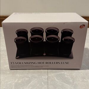 T3 Hot Rollers and clips..Black and copper in color.